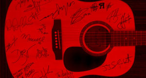 Une guitare signée par vos stars country