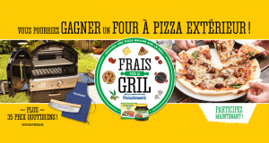 Un four à pizza noir thermolaqué Pacific Living avec chariot